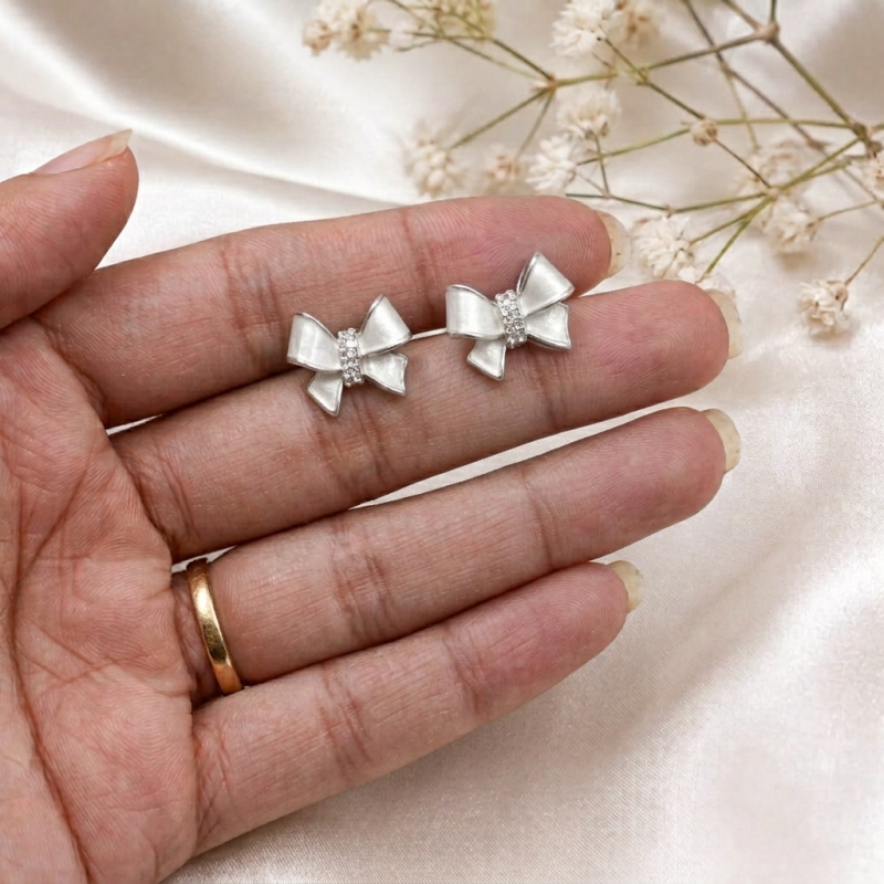 Elegant Silver Bow Stud Earrings